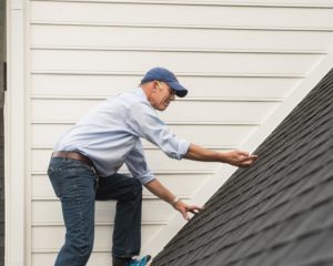 Bill Haughery inspecting a roof in Lancaster, PA